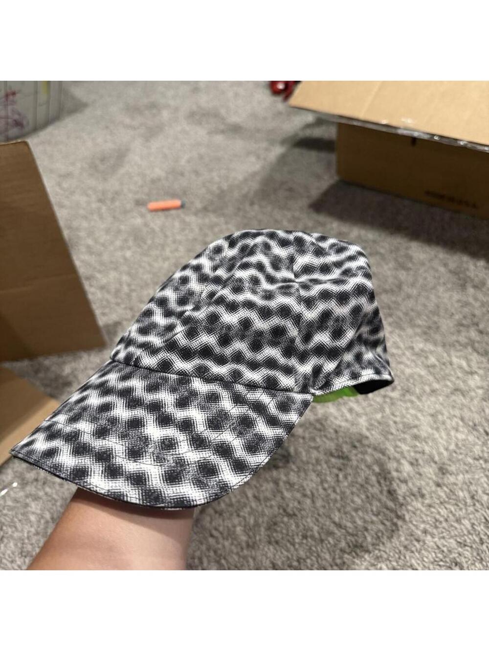 Lululemon Adjustable Black and White Patterned Hat with Neon Green Strap